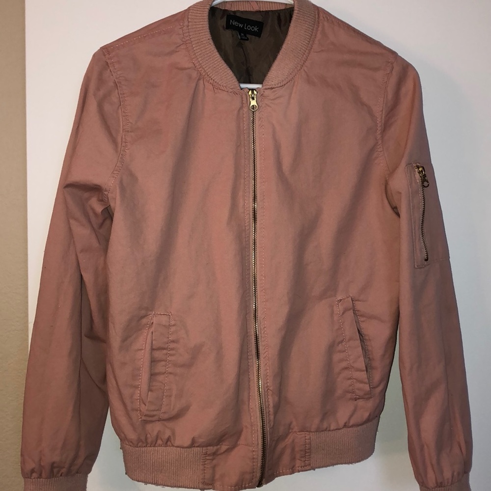 Blush pink bomber-style jacket